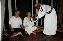 desert safari dubai serving arabic coffee